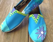 Hand painted, customized floral TOMS shoes.