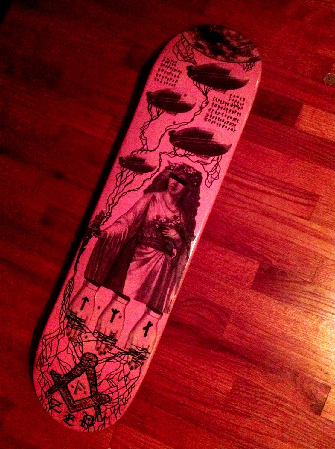 Victorian steam punk collaged pink skateboard deck