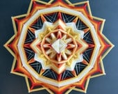 ojo de dios, a mandala woven from yarn. Decorative art piece for the wall