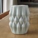 Pale blue glazed ceramic vase