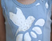 Pale blue girls dress. Organic jersey cotton beaded birds and flowers.