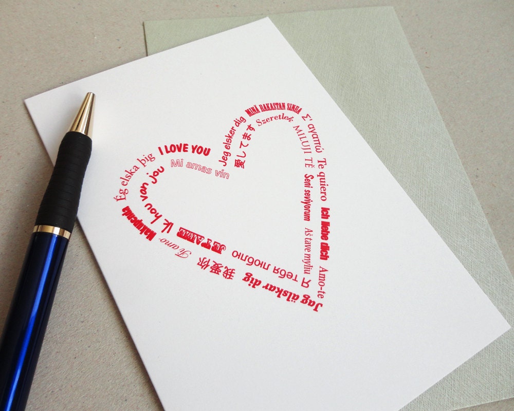 I love you card many languages red print heart shaped typography greeting card