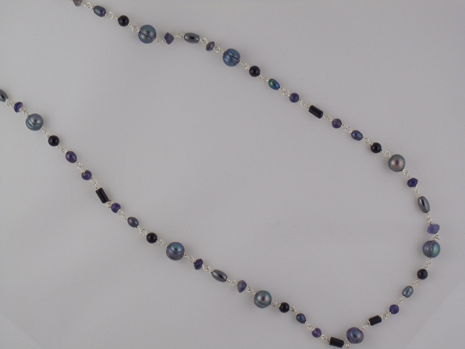Sterling silver hand wrapped labradorite,black coral, black onyx, iolite, hematite, baroque and rice freshwater pearl adjustable necklace