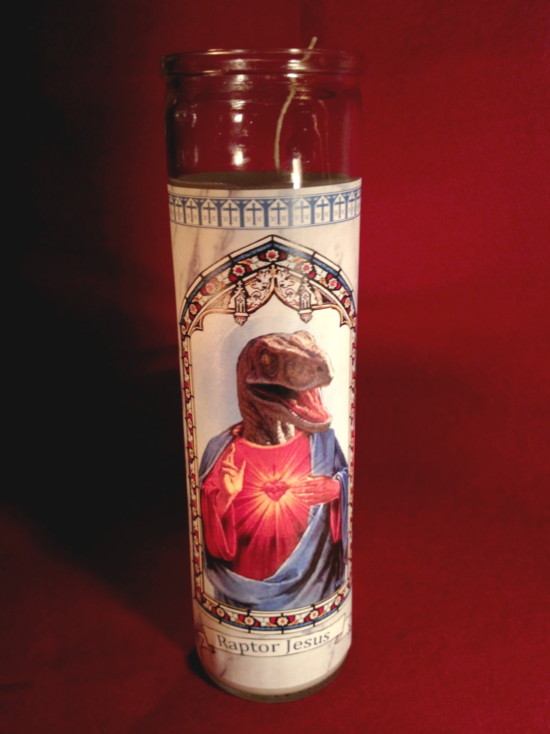 Raptor Jesus religious spiritual prayer candle by theWorldOfWeird