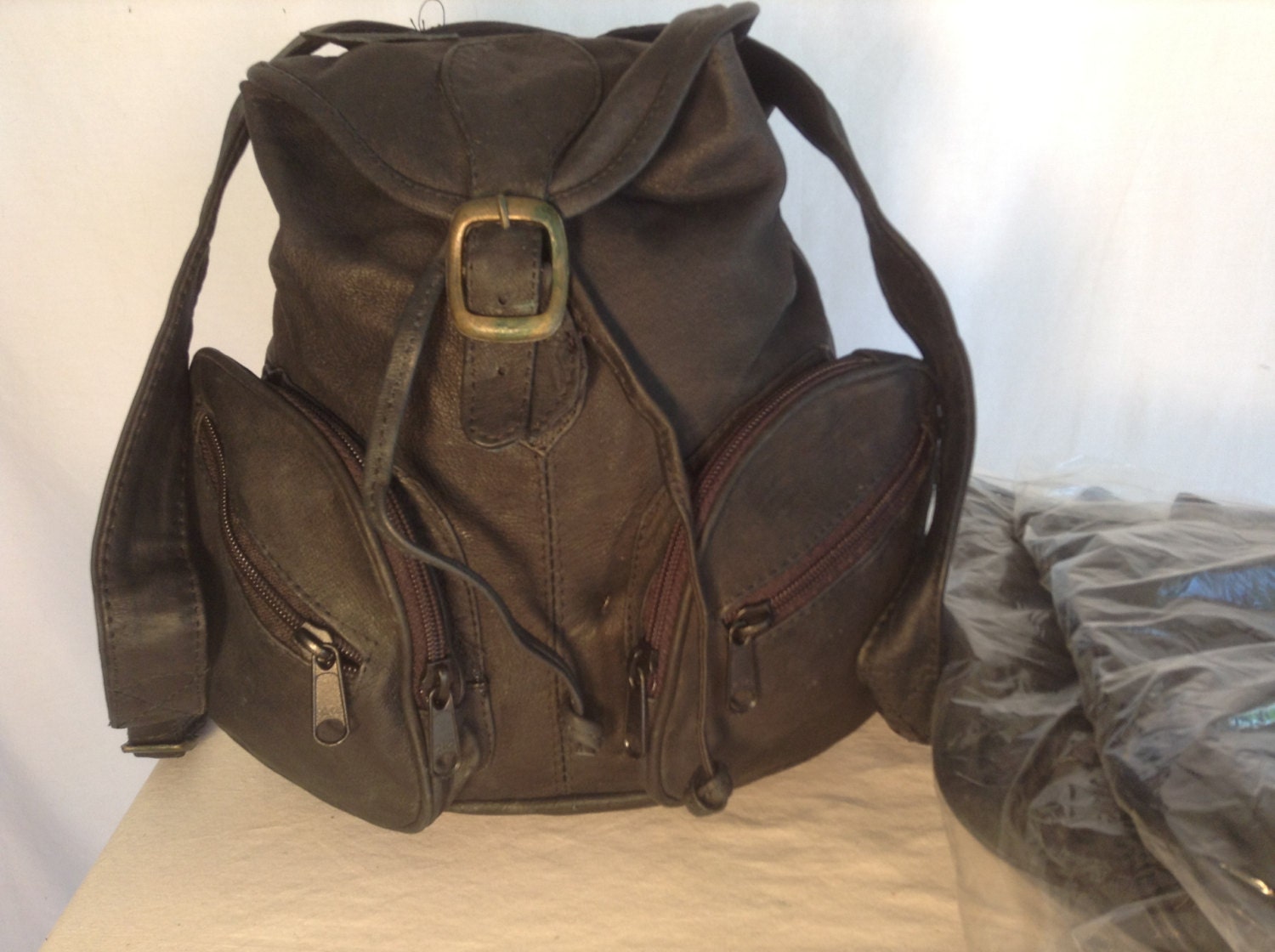 Free ship Lot of 4 black vintage leather backpacks 1970s bags purses Free shipping