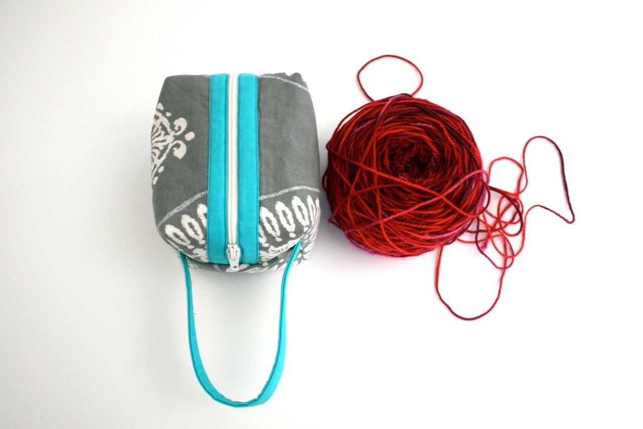 Yarn holder, Cube knitting notions, crochet notions, sewing kit, emergency kit, band aids baby pacifier, earphones, lip balm,