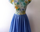 50s style cap sleeve tea dress in vintage floral cotton and blue pleated skirt