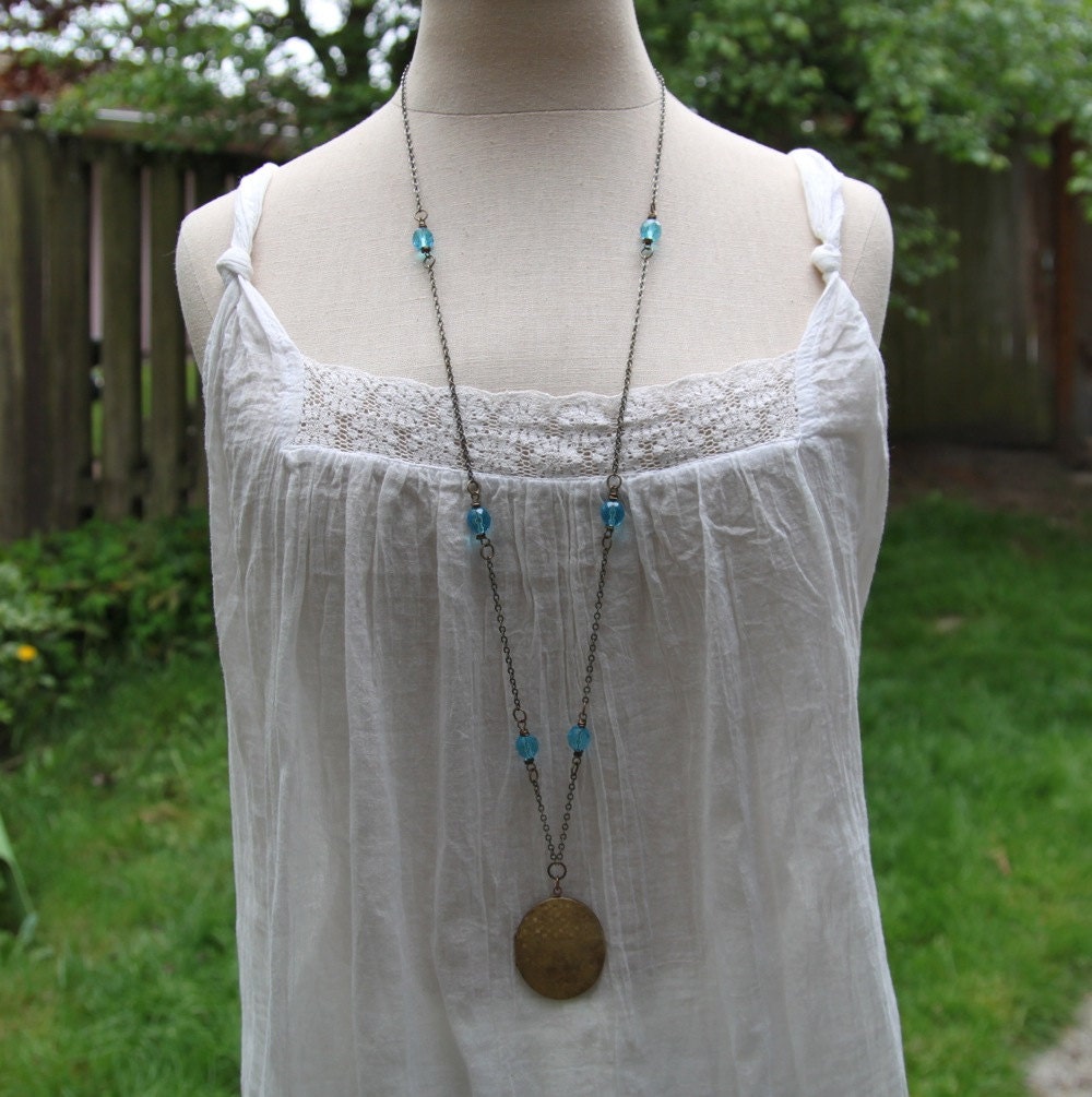 i am home . a hand stamped soul mantra oval locket necklace