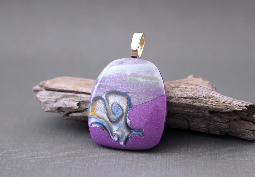 Polymer clay pendant. Polymer clay jewelry. Glossy finish.  Funky. Magenta blue.