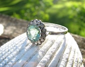 Elegant Vintage 18K White Gold Diamond Halo Ring - Lovely Green Gem Center with Diamond Halo