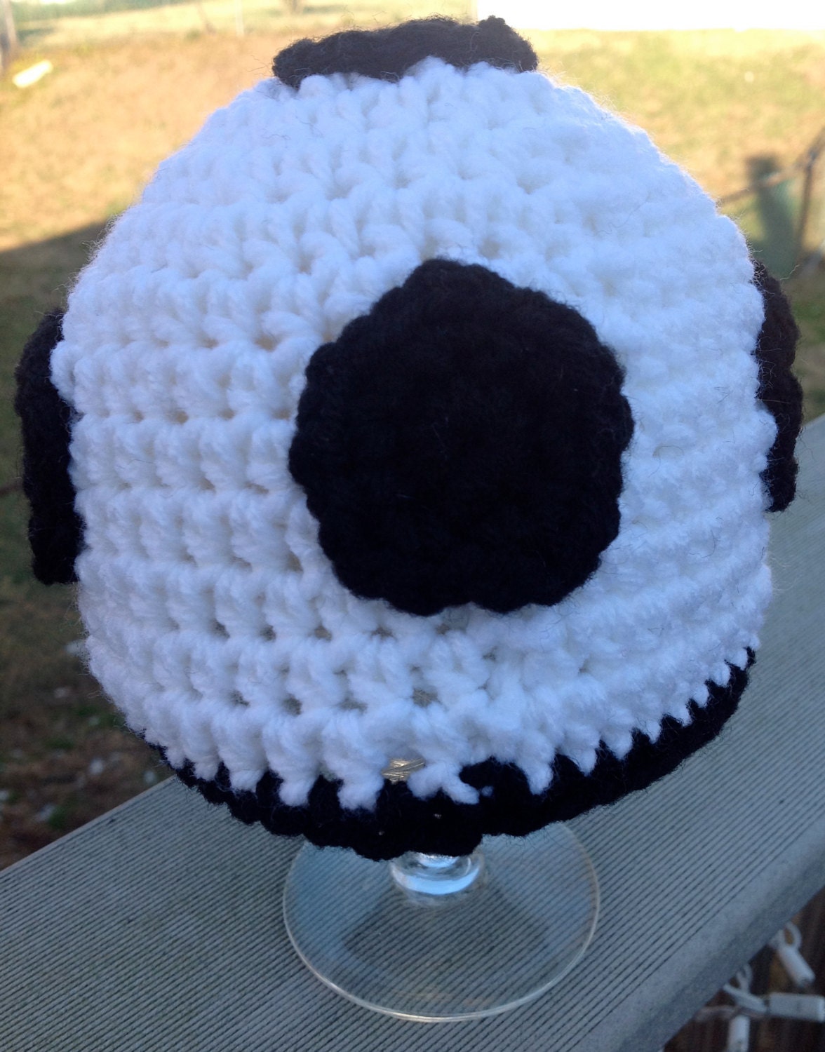 Crocheted soccer hat for babies in three sizes