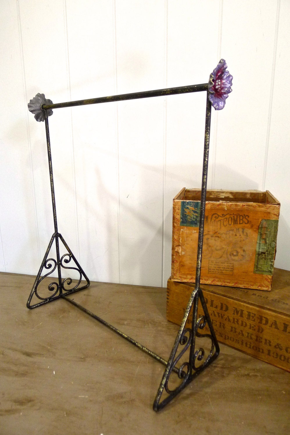 Tall metal necklace rack with enamel flowers - great for shop display