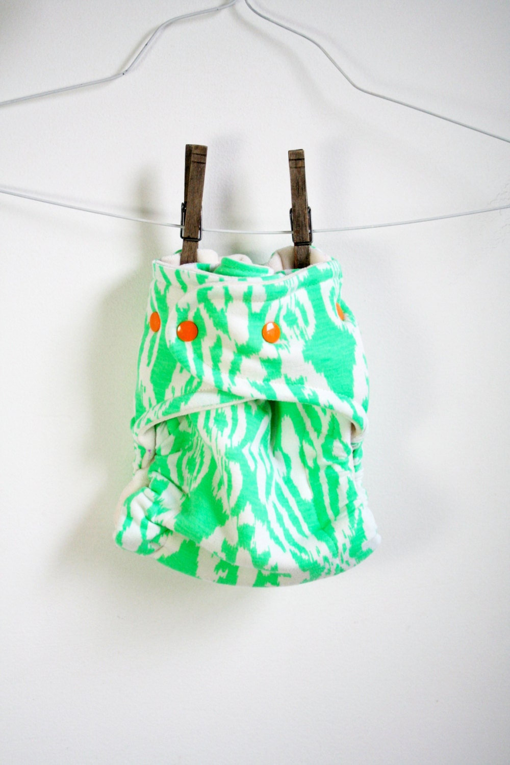 fitted cloth diaper - green ikat cloth nappy - MCN - one size OSFM cloth diaper - bright orange snaps