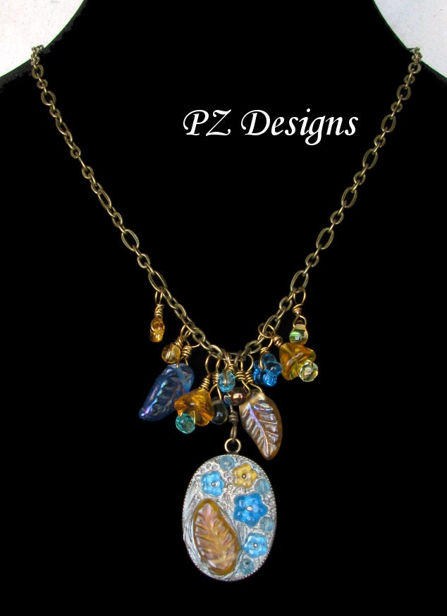 Mini Flower Garden Pendant - Blue & Yellow Flowers, Glass Leaves, Antique Brass Setting with Chain