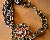 SunSpear an Asymmetrical multi chain bracelet