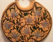 Vintage Seventies-style embroidered orange purse