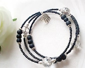 Black three layer bracelet with bright beads