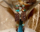 Aqua and caramel picasso sea horse earrings Pamelia Designs
