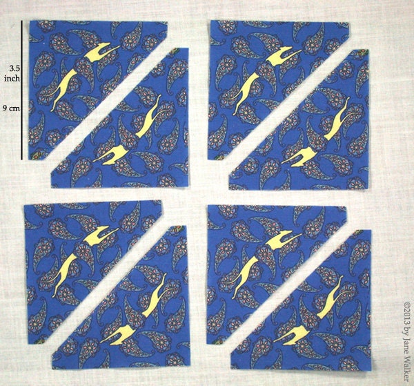 Die Cut 3.5" quilt triangles, Greyhound and blue paisley fabric, 8 pieces