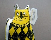 Yellow cat screen printed plush character. Bright yellow and black screen printed 'Stanley' cat doll, natural calico