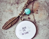Greater is He 25 mm pendant