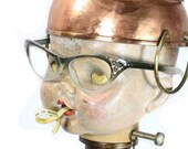 Found Object Art Doll  - Kate Geiger - What Goes In Must Come Out - We have to be taught...