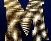 Sugar lips tank top with a royal blue "M" across the front. And class of 26 on back.