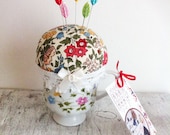 Floral fabric teacup pincushion with dressmakers novelty pins