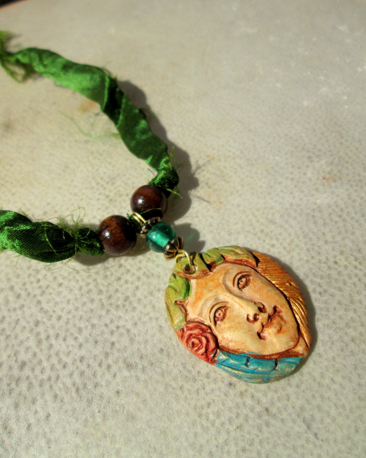 Gwendolyn. Bohemian Polymer Clay Pendant on Green Recycled Sari Silk Ribbon Necklace. Turquoise & Brown Beads.