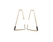 beaded trapezoid geometric hoops