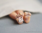 Dead man in the book. Unusual art bookmark. Legs in the book. Spooky gift. For children, kids, all, him, her . Neutral biege corpse