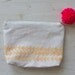Hand Stamped Canvas Sundry Bag with zipper and pom pom