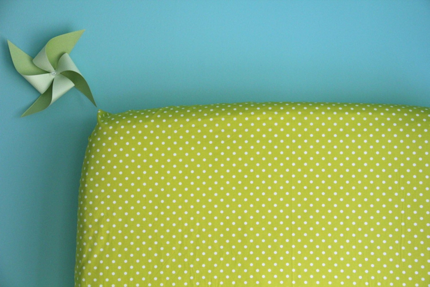crib sheet in organic grass dots