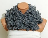 The scarf is knitted with Grey,flamenko scarf... soft yarn. Long scarf. Romantic. For her. HAND MADE.