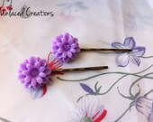 mary. a pair of purple resin flower bobby pins -brass.