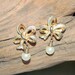 Vintage Bow and Pearl Goldtone and Sage Earrings