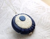 White lace and midnight blue long polymer clay pendant