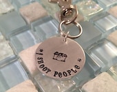 Handstamped photographer zipper pull or purse dangle - I shoot people - gift for photographer or camera buff