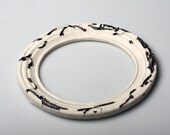 White round frame in stoneware Limoges porcelain and red clay