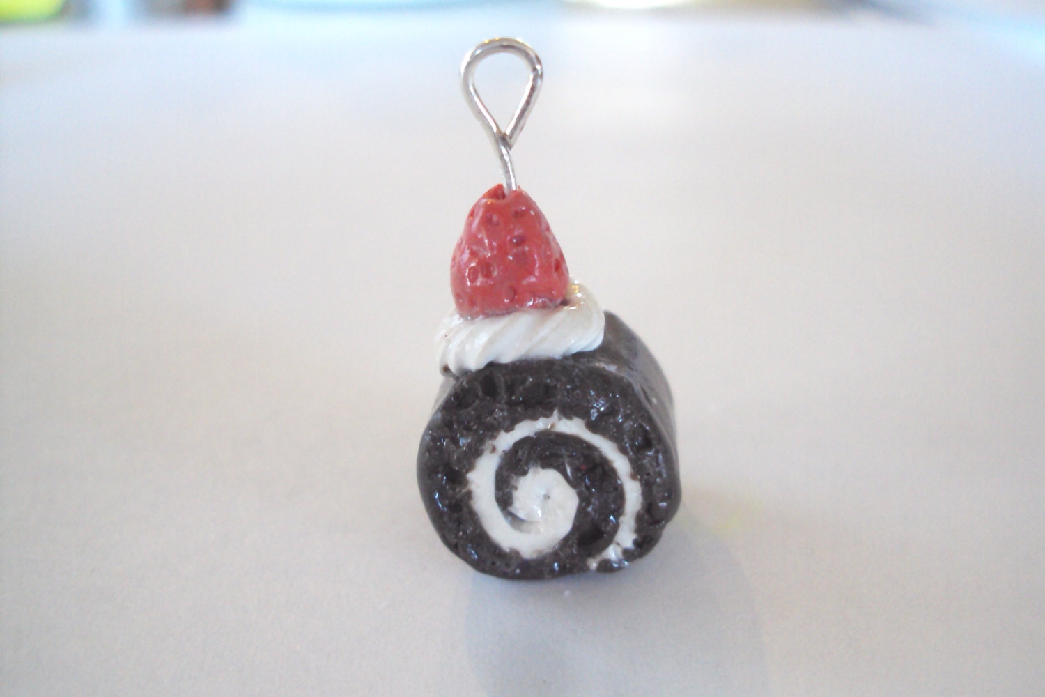 swiss roll polymer clay charm