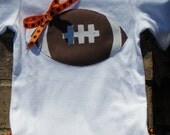 CUSTOM made baby girls football onesie, creeper, one piece, bodysuit, onsie with custome ruffles and ribbon, shower gift, orange and black