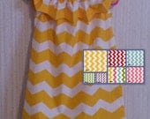 Chevron print dress with elastic flounce neckline. girls. yellow, pink, red, purple, multi, green, blue
