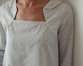 Blouse Take Care cream with little geometric design