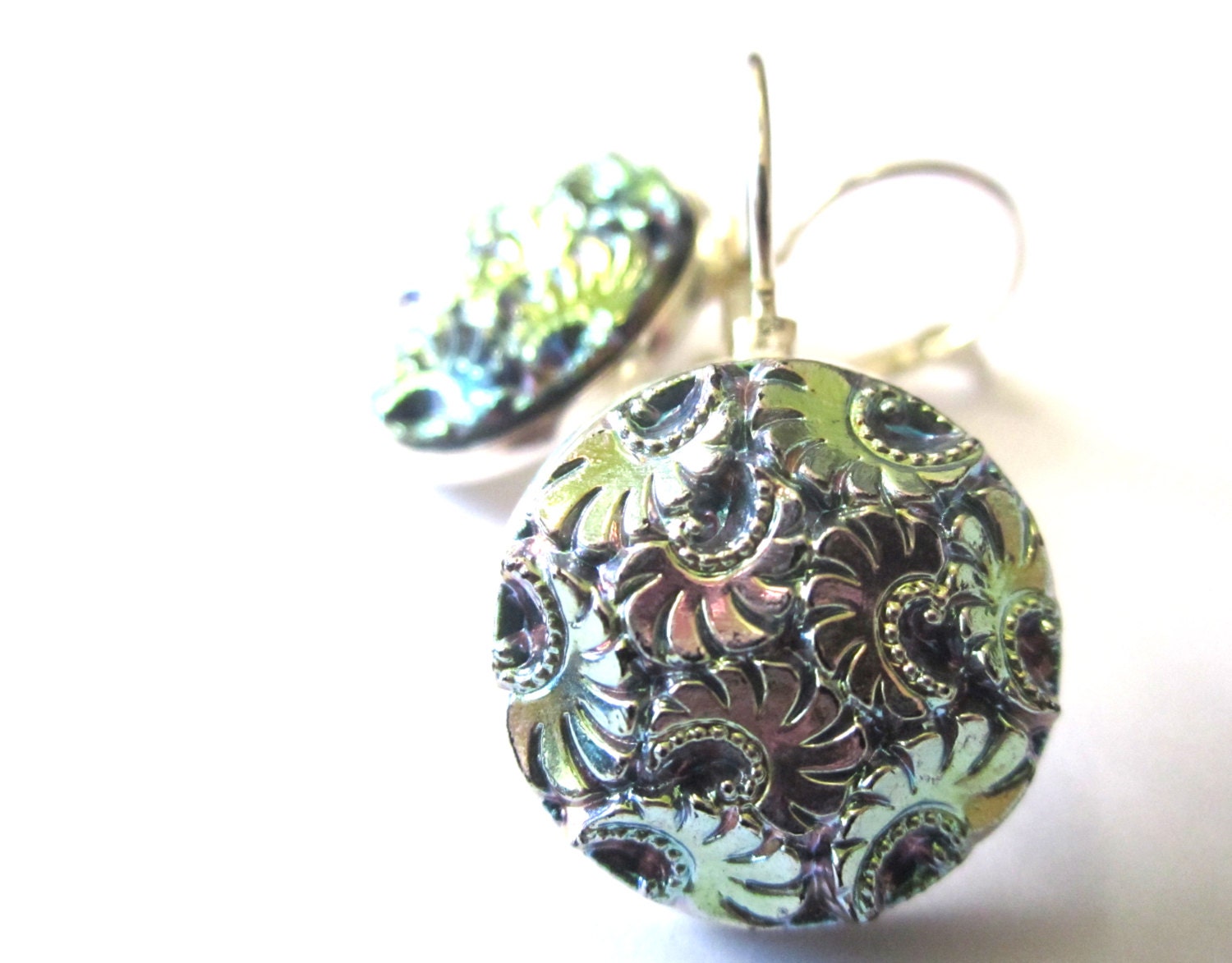 Antique glass button earrings, absolutely iridescent, silver leverbacks. Medium size buttons