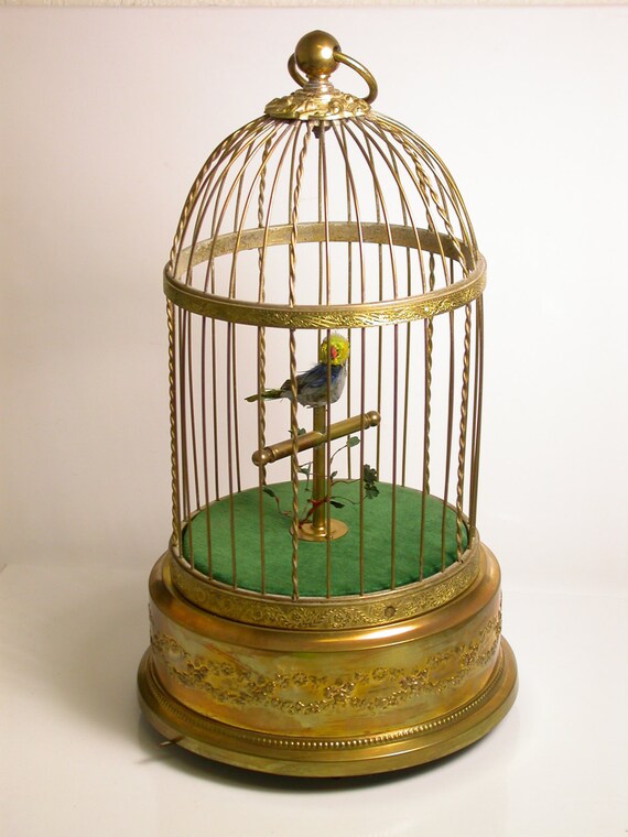 Items similar to Antique Mechanical Singing Bird in Cage Wind Up on Etsy