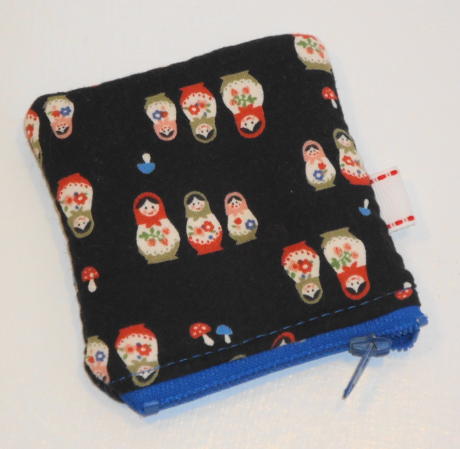 Matryoshkas Petite Square Padded Zippered Pouch -- Nesting Dolls on Black