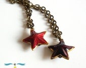 Cloisonne star charm necklace on 18" antique gold plated chain, red or purple star