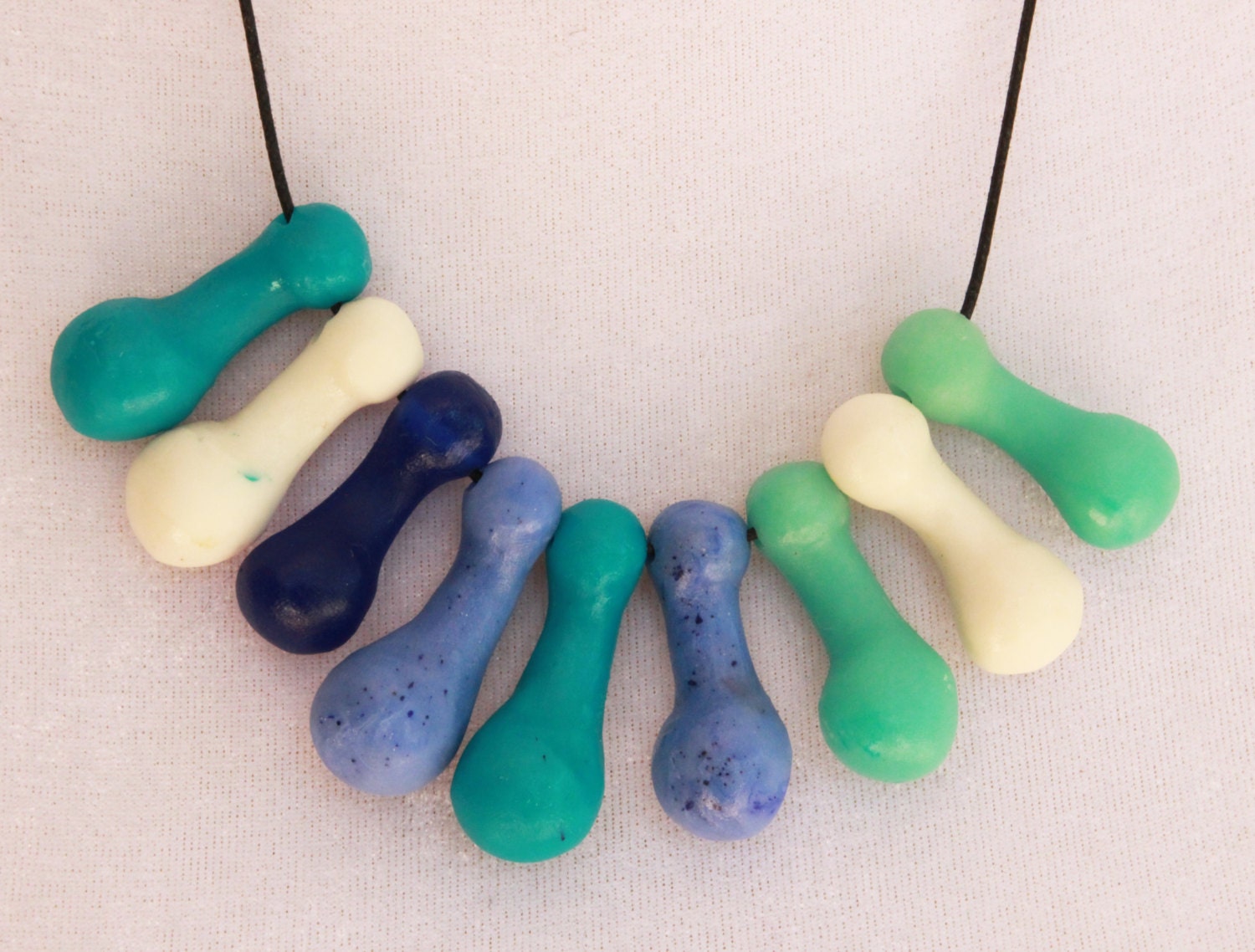 Shades of blue barbell bead adjustable resin necklace