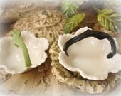 tiny vinTaGe porcelain trinket baskets . marked GEMMA . czechoslovakia . numbered . ivory with black and green handle