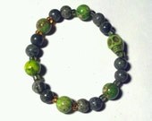 Green Beaded Bracelet w/Green Skull